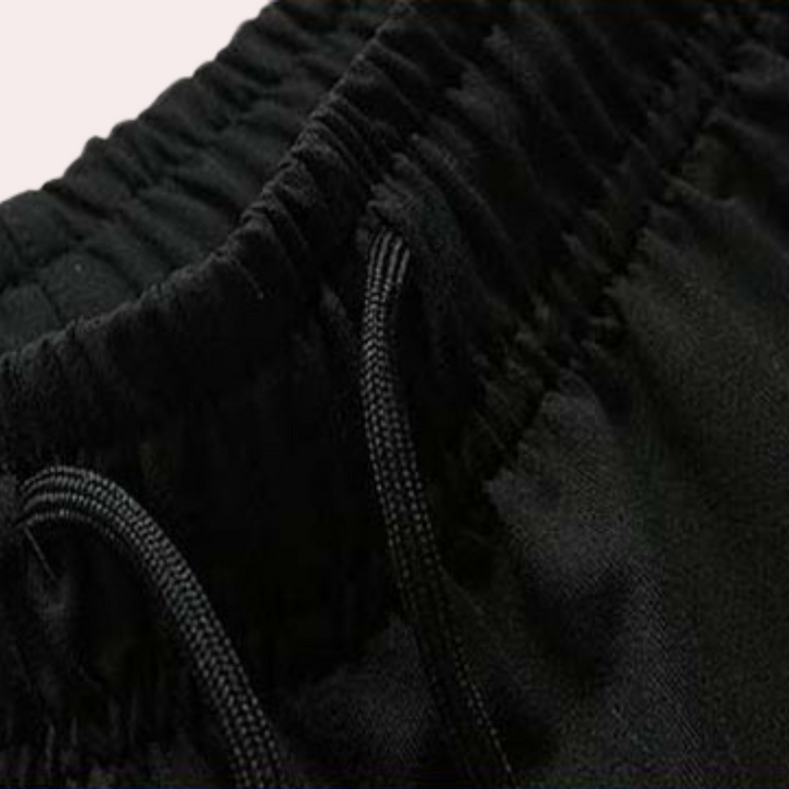 Lightweight &amp; supportive men’s training Pants – fitted design, breathable polyester, for summer workouts